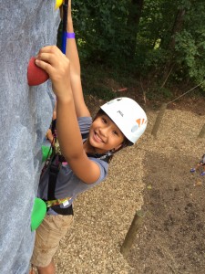 Girl Climbing Rock Wall