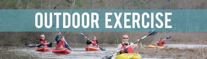 Group of people kayaking with the words Outdoor Exercise written across