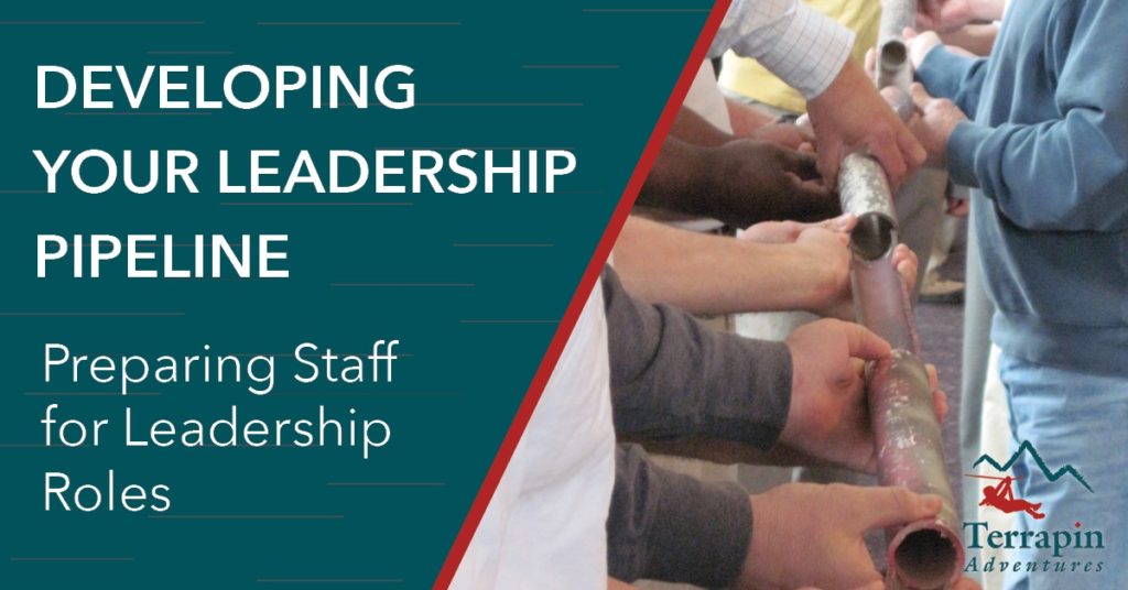 Text reads: Developing Your Leadership Piepline. Preparing Staff for Leadership Roles. The image shows a group of people holding pieces of pipe together in a row.